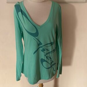 Oakley size M long sleeve top. New.